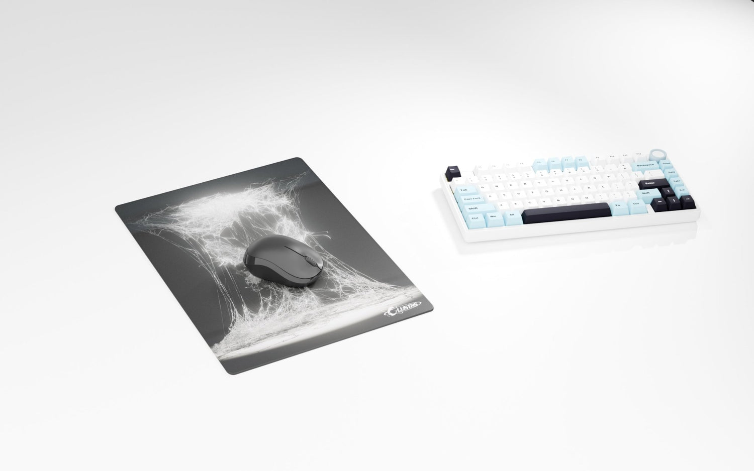 CLUSTRS custom glass mousepad beside a cloth pad, showing smooth glide, consistent control, and custom setup style