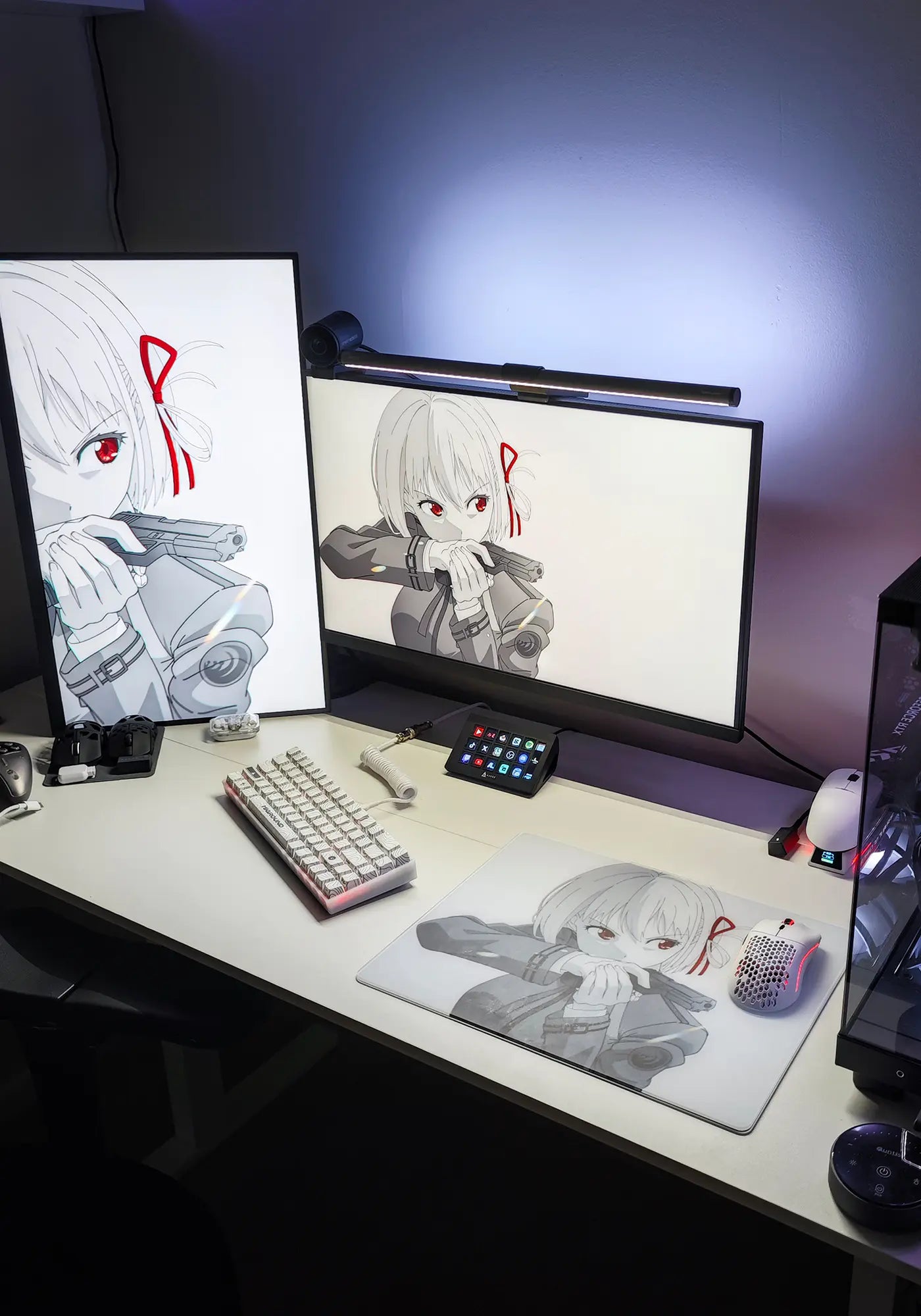 FPS_game_streamer_s_desk_equipped_with_a_CLUSTRS_glass_mouse_pad