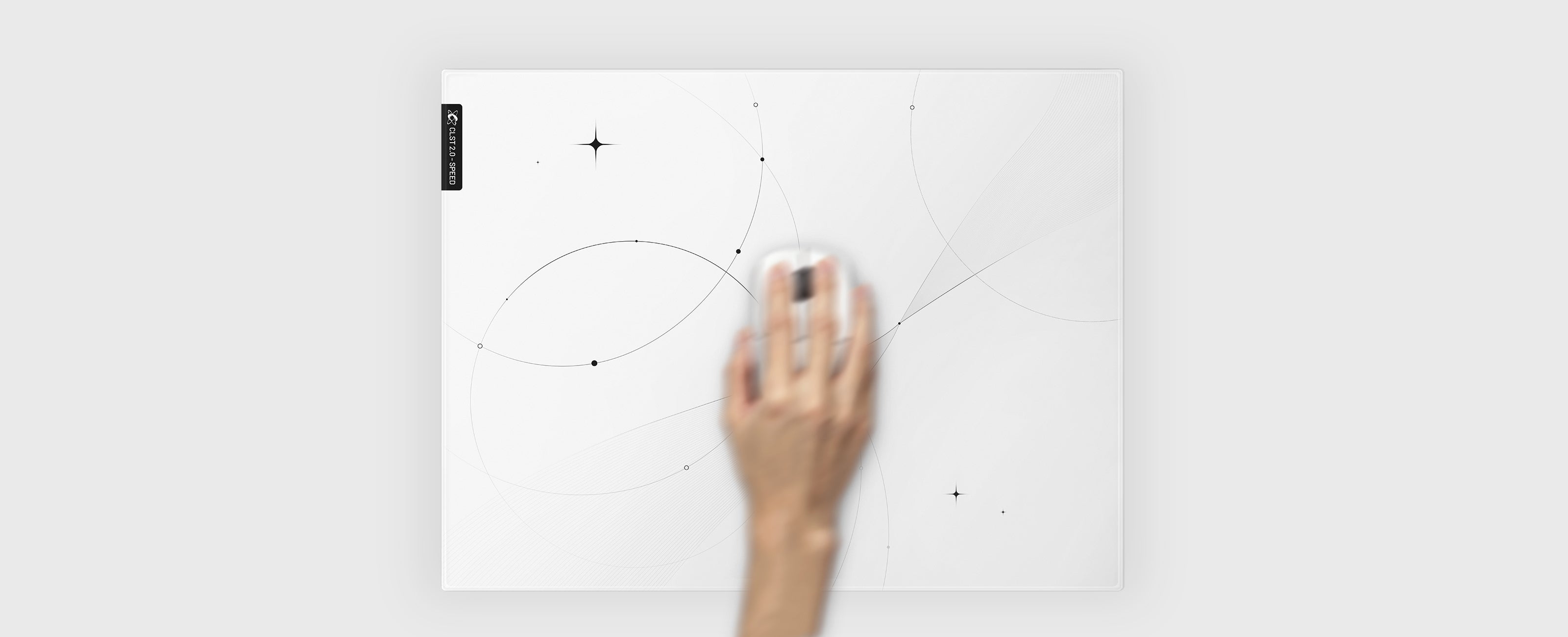 Hand moving across the finer micro-etched surface of the CLST 2.0 Trace glass mousepad
