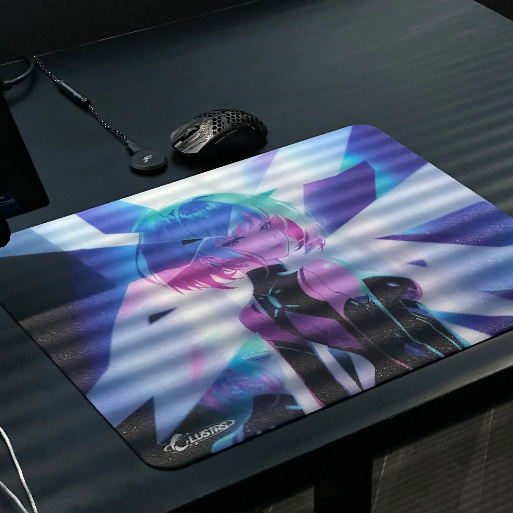 CLUSTRS ASTRA glass mousepad displayed in a clean gaming desk setup.