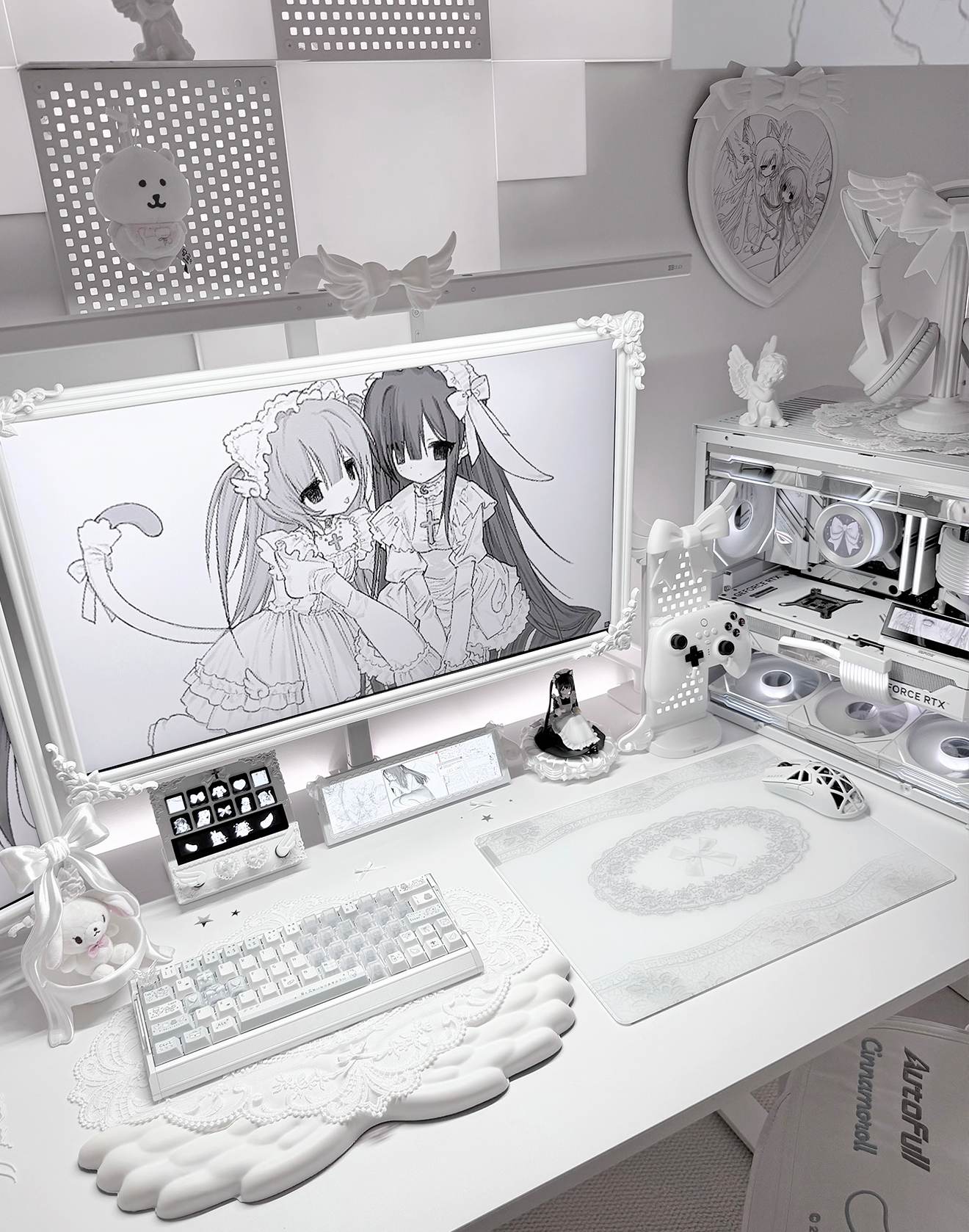 White Lacey glass mousepad completing an elaborate white angelcore gaming setup with multiple displays and custom PCs.