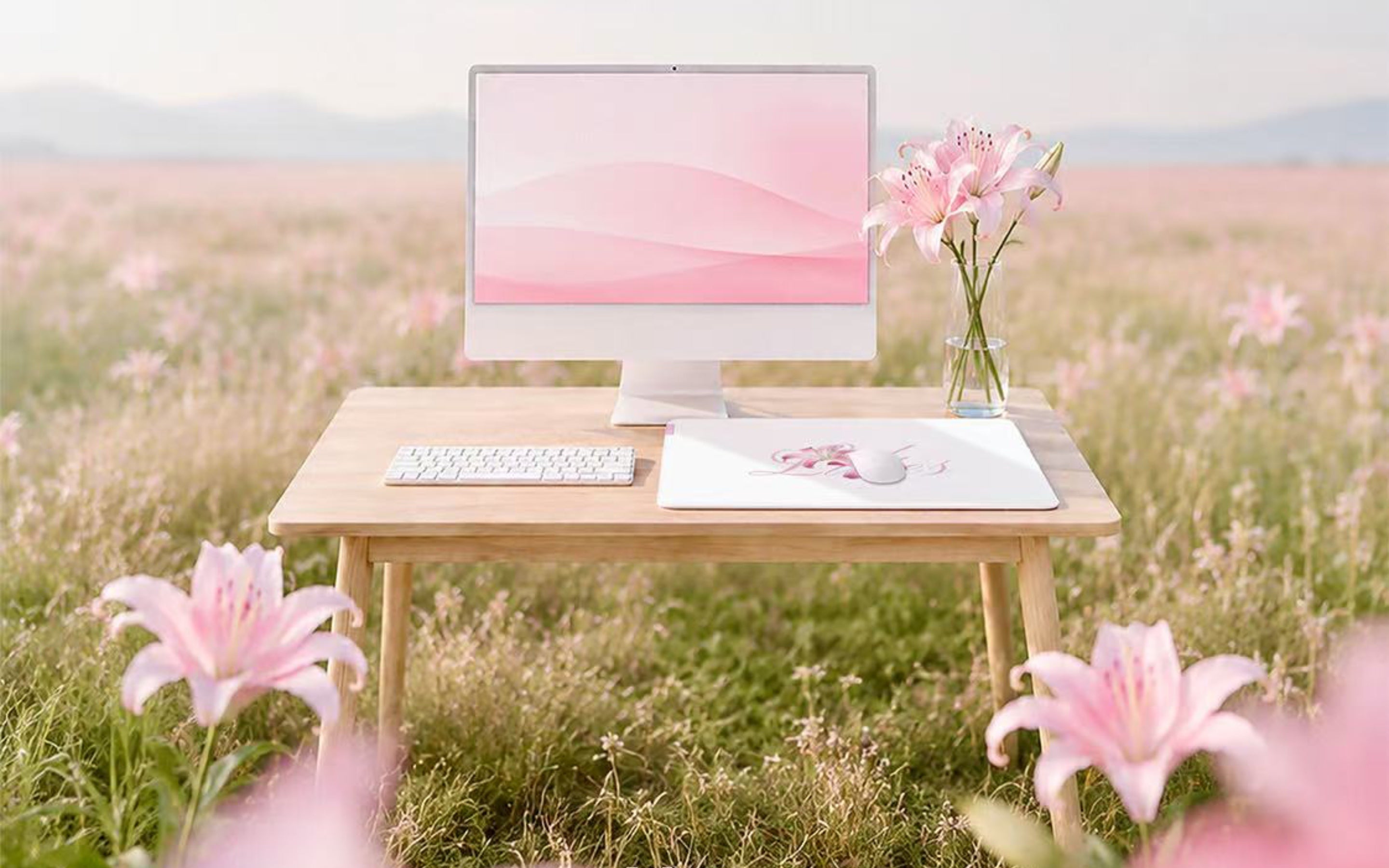 CLUSTRS Lilies glass mousepad in a shared gaming setup, showing floral style, smooth control, and community vibes
