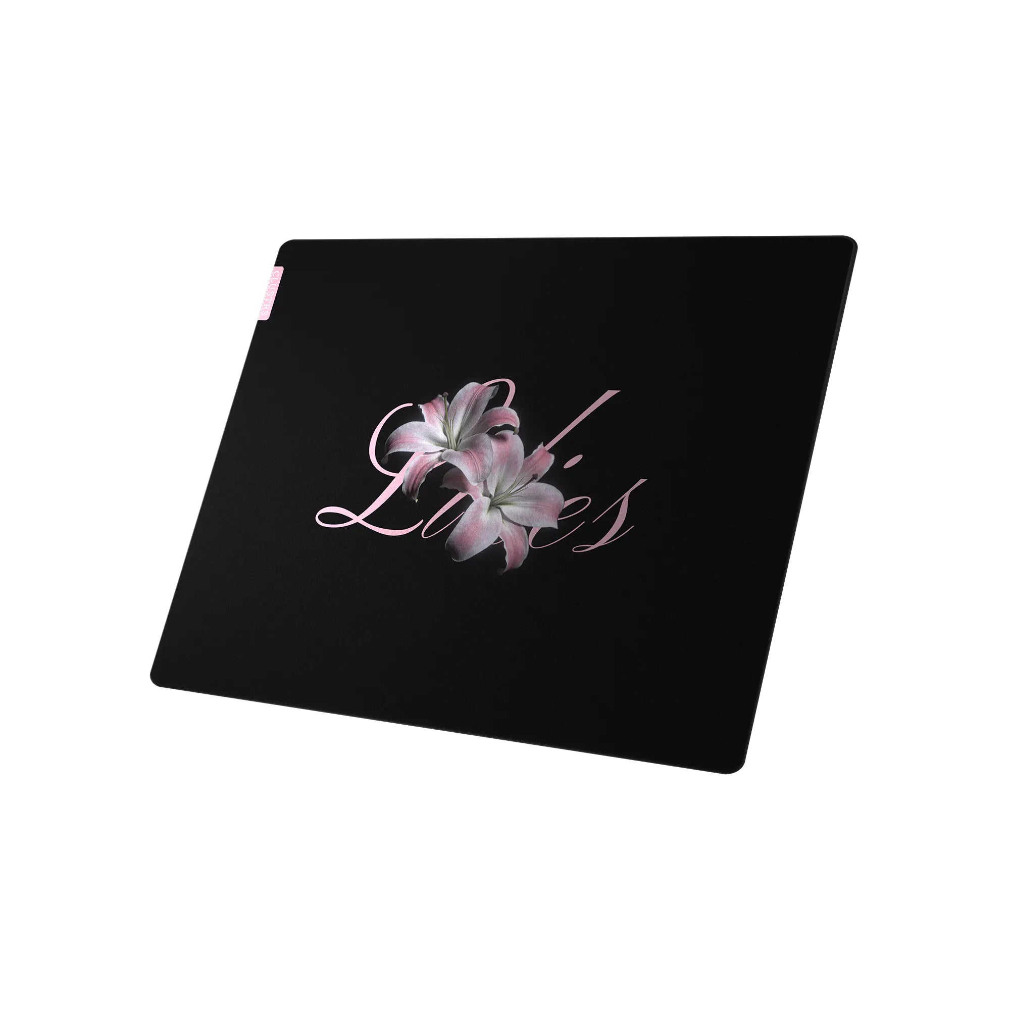 Close-up detail of micro-etched glass mouse pad surface and smooth edges with lilies pattern