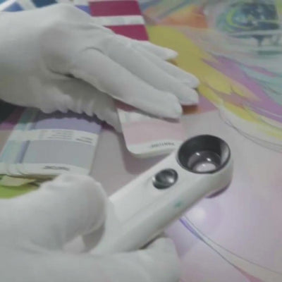 Behind-the-scenes look at the CLUSTRS custom glass mousepad process, including image review, color adjustment, and print preparation.
