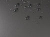 Water droplets on the AF-treated surface of the CLST 2.0 Trace glass mousepad